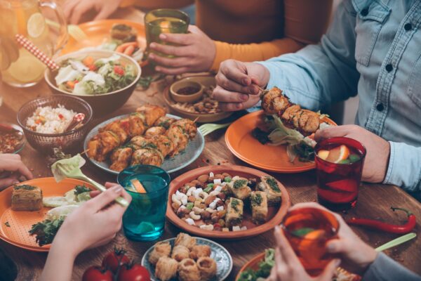 A tablescape with healthy food options and lemon water
